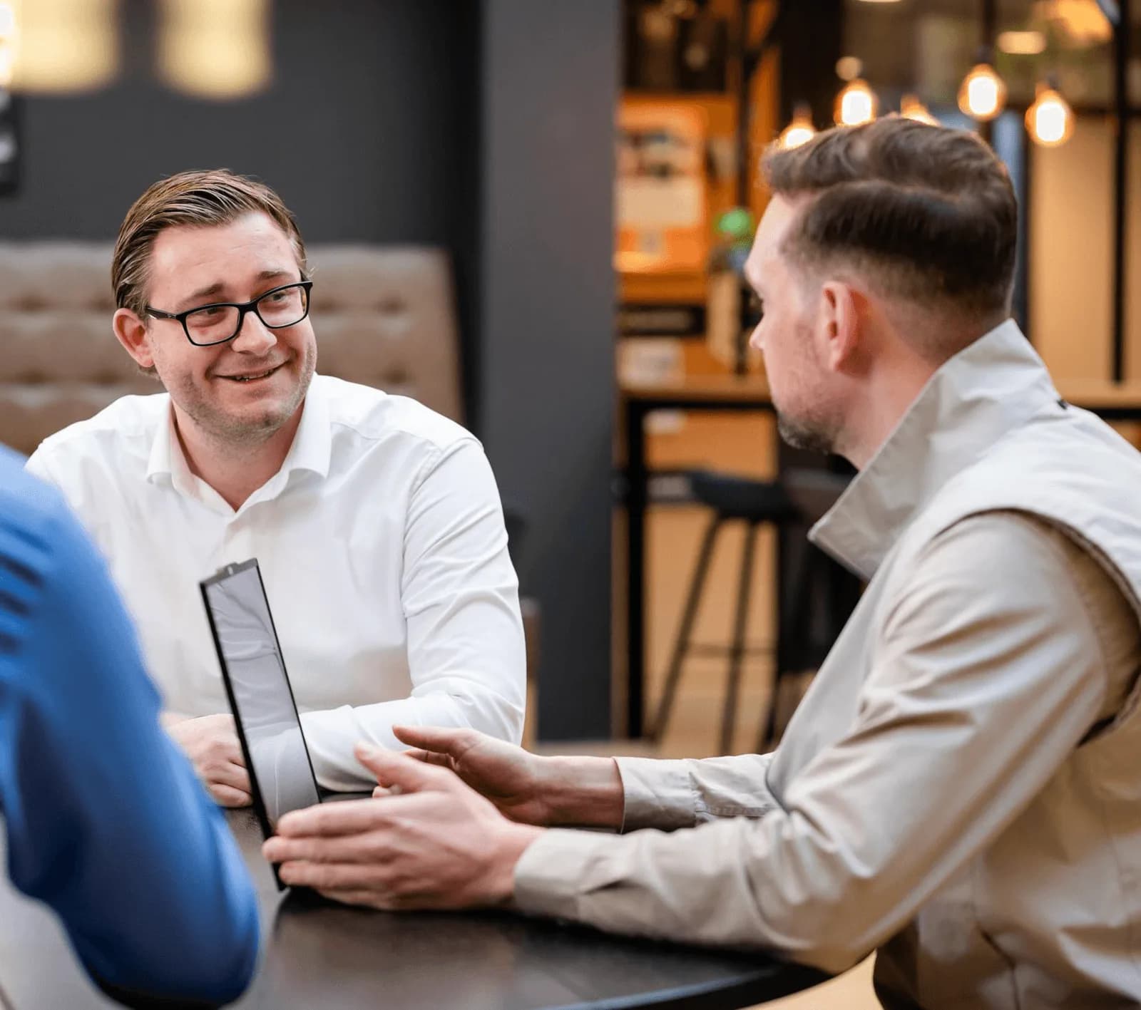 Consultants van The New Wave IT in overleg